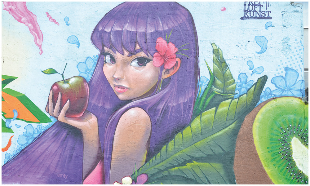 An Eva mit dem Apfel erinnert das von einem Sprayer gestaltete Graffiti.